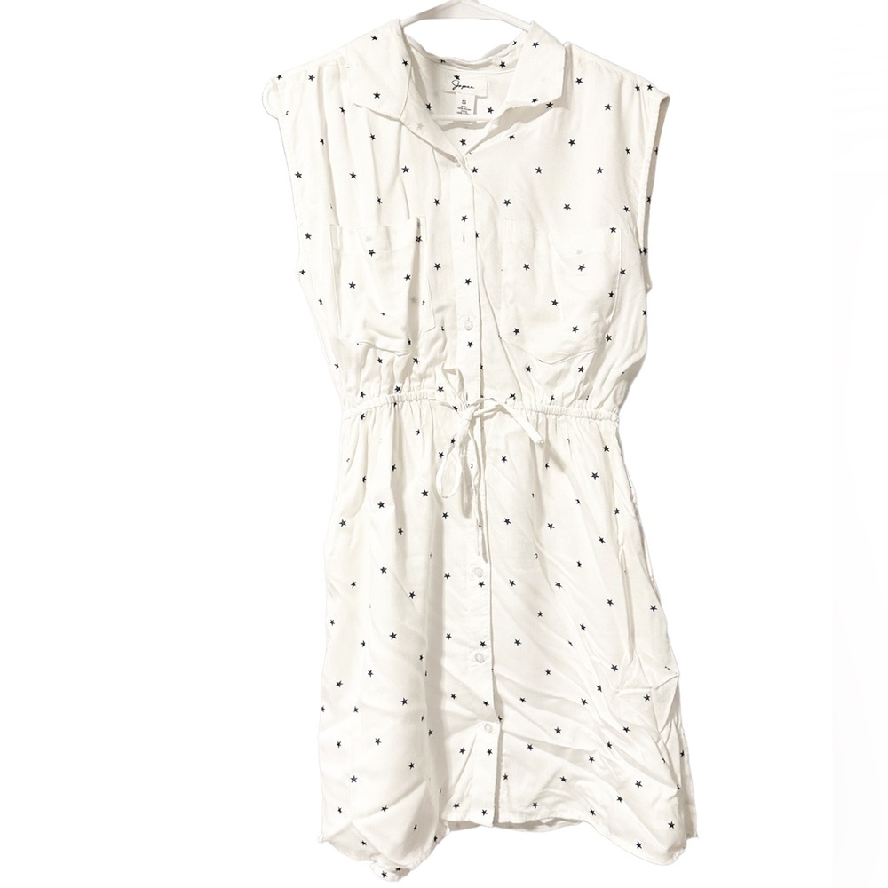 White romper with buttons and a string to tie around